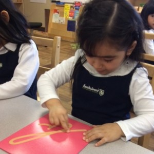 Sophia working with the Sandpaper Letters